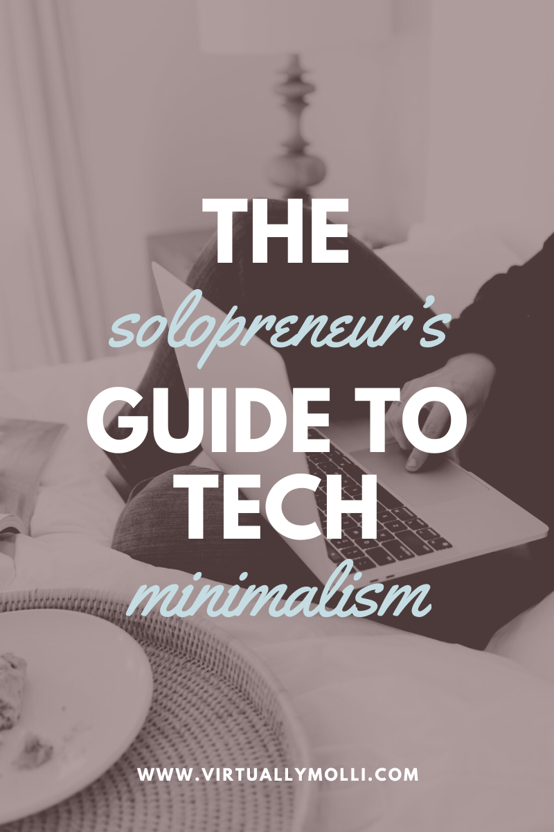 A creative solopreneur looking overwhelmed by too many open tabs, illustrating the need for tech minimalism and choosing software for your actual brain, not a fantasy version.